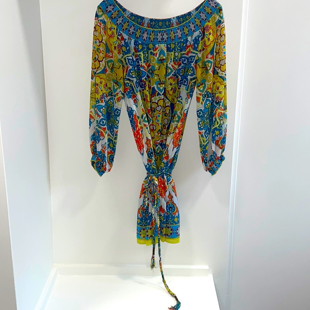 Lined sheer multicolored 3/4 sleeve blouse. Braided belt ties at low waist.